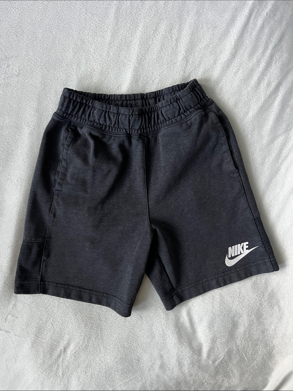 Boys Nike Black Shorts with White Swoosh Logo